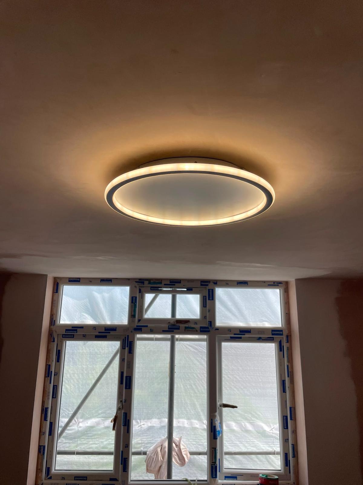 Ceiling feature light fitted above newly installed windows