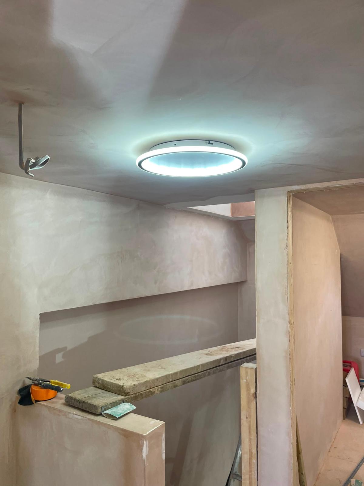 Feature ceiling light installed during a refurbishment before final decoration