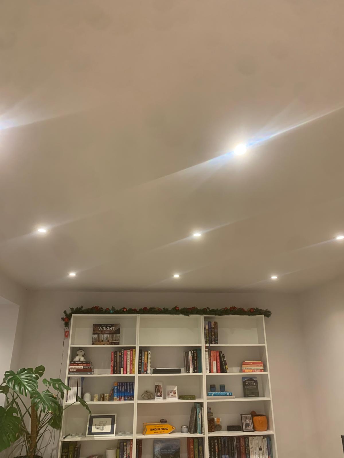 Recessed ceiling downlights installed in a living room
